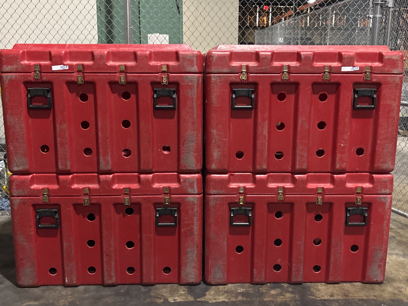 (4) Large red plastic boxes