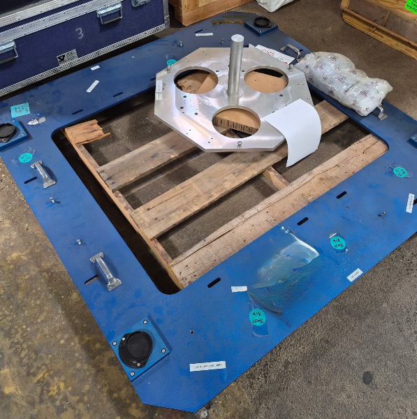 Blue anodized aluminum machinery part