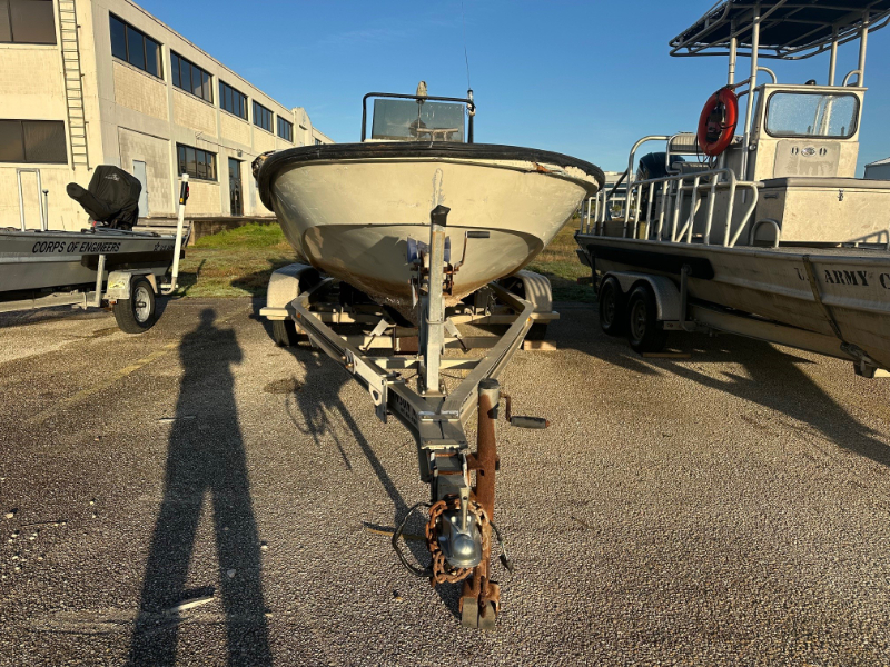 Boston Whaler with Outboard Engine and Trailer